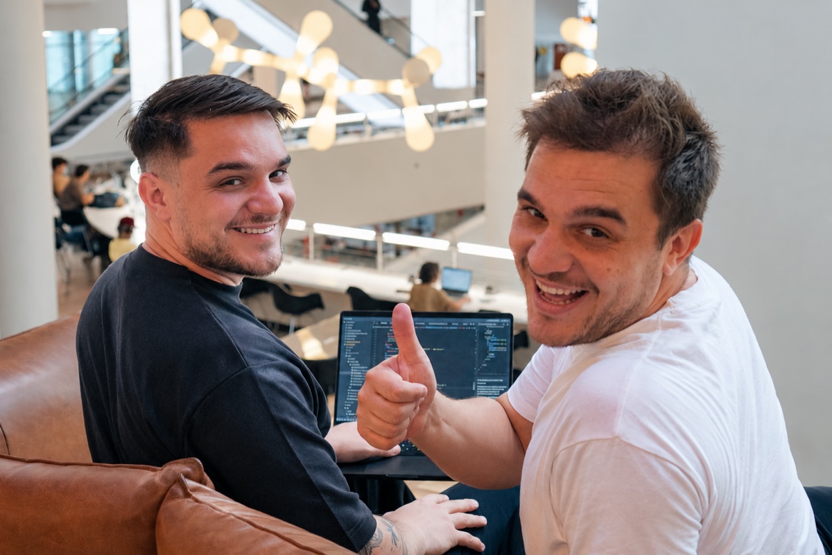 Bogdan and Dragos coding together
