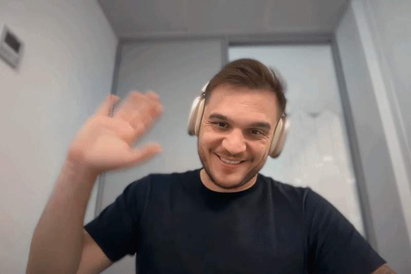 Dragos waving hello at the start of a get-to-know call